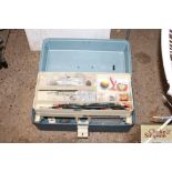 A fishing tackle box and contents