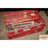 A metal tool box and contents