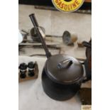 A cast iron Baldwin long handled cooking pot (14 p