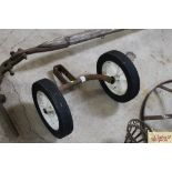 A pair of wheels with axle