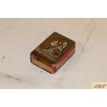 A vintage brass Norfolk Regiment matchbox holder