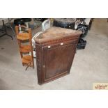 A 19th Century oak corner cupboard