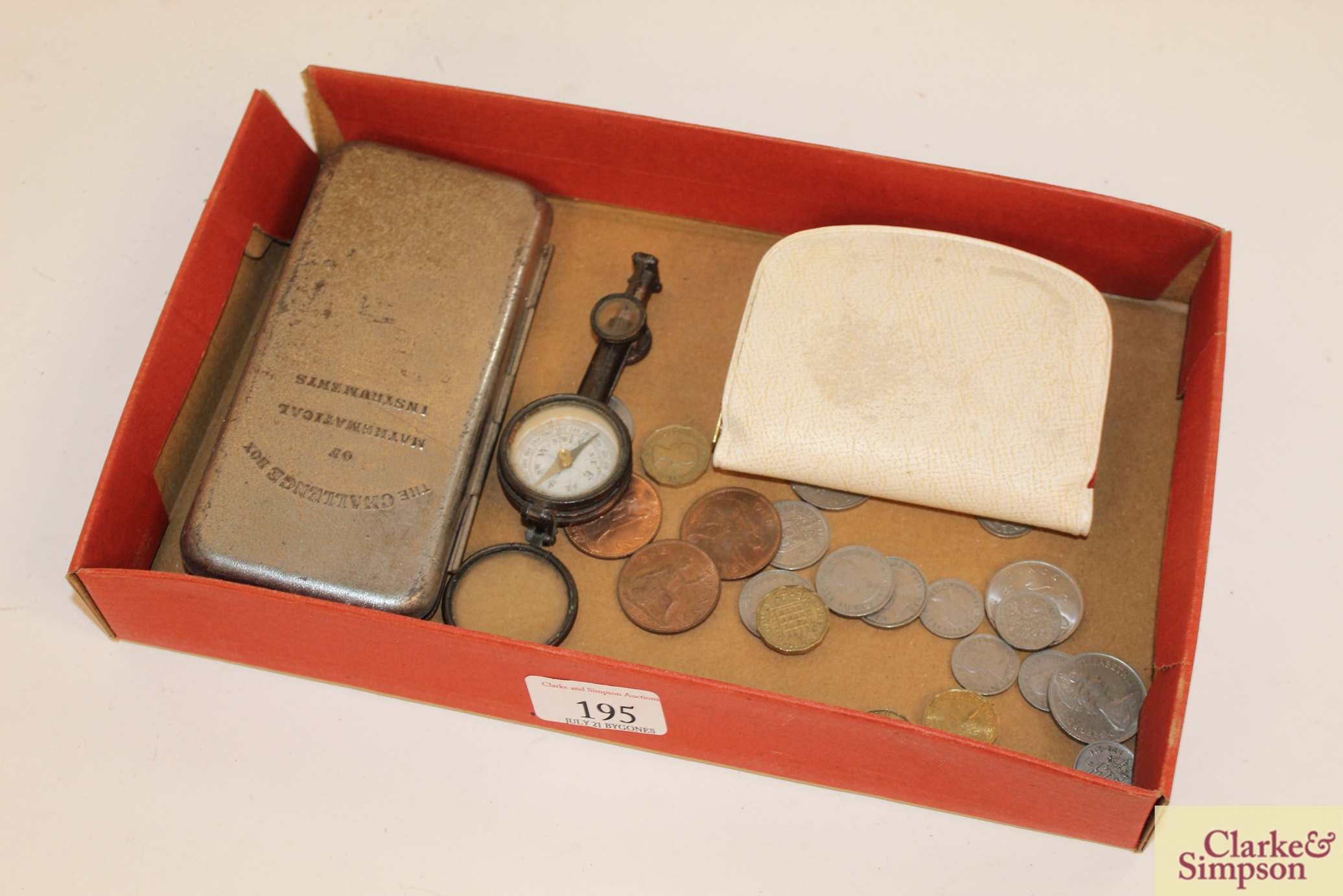 A metalware drawing instrument box; a compass; va