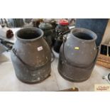 Two milk churns with metal swing handles
