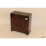 An Art Deco oak cased radio speaker