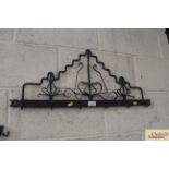 A large early 19th Century wrought iron six hook k
