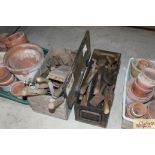 A wooden box and contents of various hand tools a