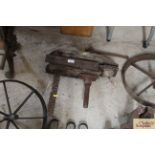 An old wooden vintage bench vice