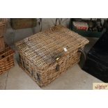 A large wicker laundry basket