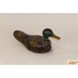 An old painted wooden decoy duck