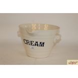 A Victorian style shop double handled pail, marked "Cream"