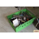 A plastic container of tools and tool heads