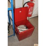 A large red metal box and contents of fire rescue