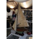 A large vintage pond yacht