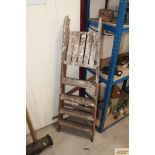 A small wooden step ladder