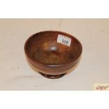A 19th Century sycamore footed dairy bowl