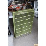 A set of green workshop shelves