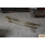 Three old brass curtain poles with rings (AF)