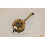 A rare early 19th Century brass clockwork rotating