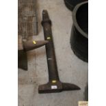 A cast iron blacksmiths anvil extension tool