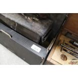 A box containing an ammo box, tray, wooden trays,