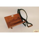 An iron and wooden mounted herb cutter