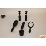 A quantity of ebony dressing table ware