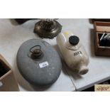 A stoneware hot water bottle, and a galvanised wat