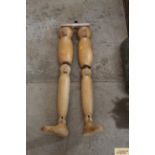 A pair of vintage wooden joint mannequin legs