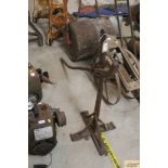 An old metal cart jack