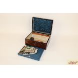 A Victorian rosewood sewing box with brass carryin