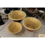 Three cream glazed earthenware crocks