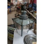 A large copper street lantern top