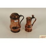 A copper baluster vessel with pierced dome lid and