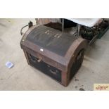 A dome topped leather bound fitted cabin trunk