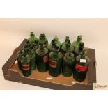 Twenty Victorian green glass chemist's bottles (12 l