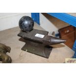 A small cast iron Harper anvil with ball attachmen