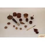 A box of miscellaneous treen items including spinn