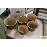 Five glazed pottery bowls