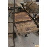 A vintage three wheel railway trolley, one wheel A