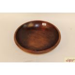 A large antique treen bowl, approx. 15" dia.