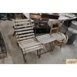 Two wooden and metal garden chairs and an elm seat