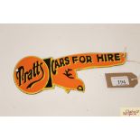 A small "Pratt's Cars for Hire" enamel sign in the