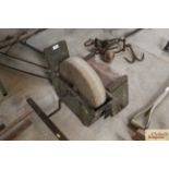 An antique boxed hand operated grinding wheel