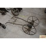 A vintage wheeled seed drill