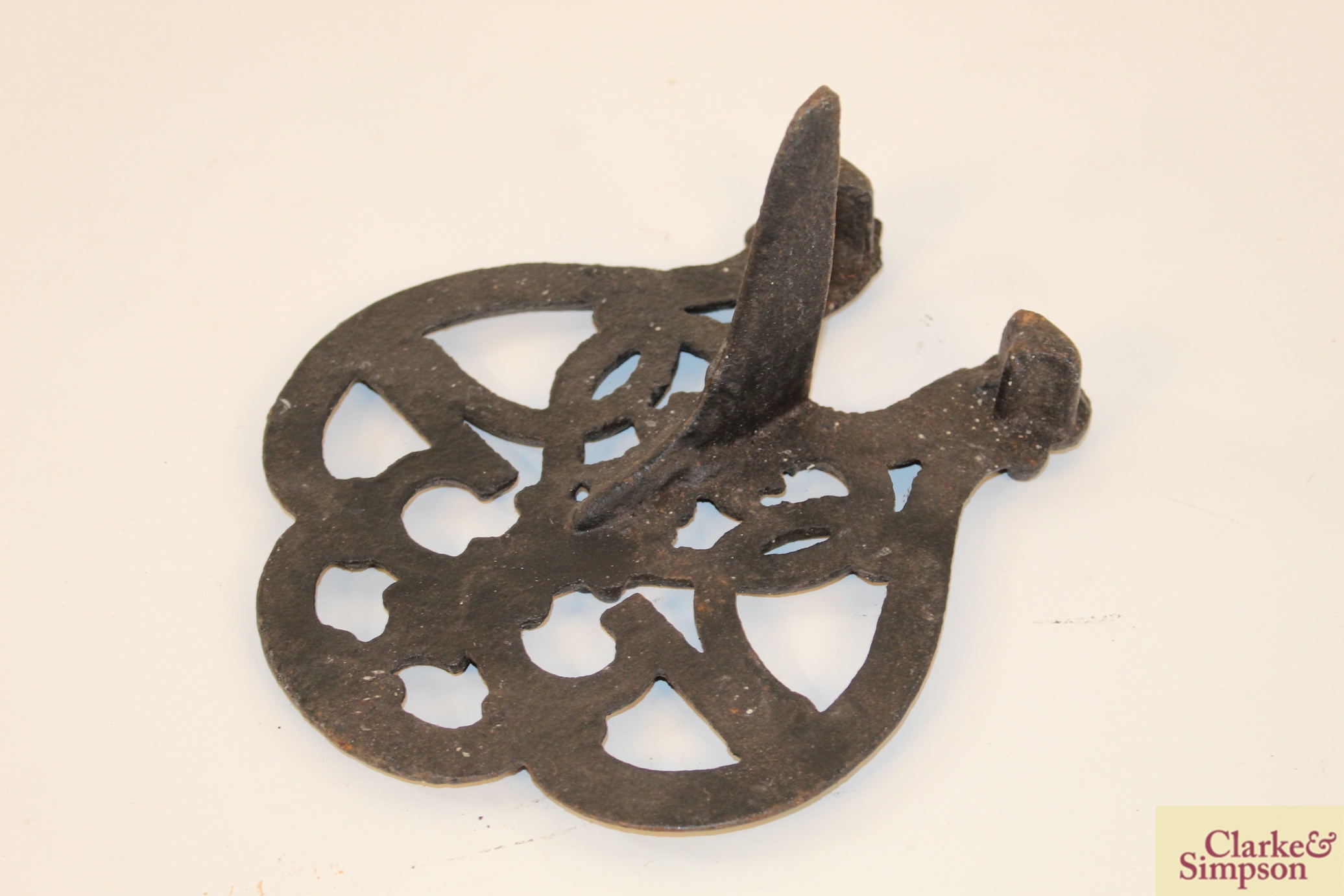 Four various ornate cast iron trivets; two flat ir - Image 9 of 20