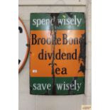 An enamel advertising sign for Brook Bond Dividend