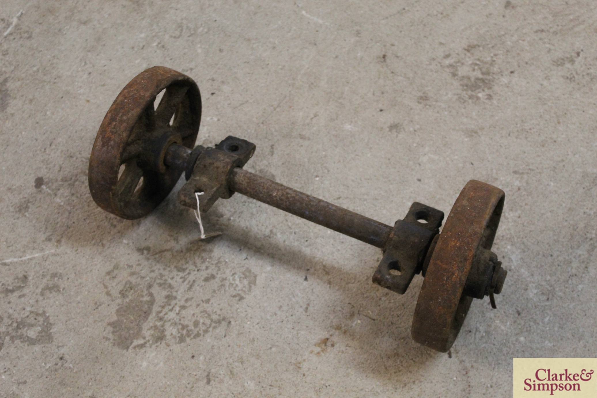 A pair of small wheels with axle, for sack barrow