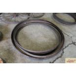 Six large metal wheel rims