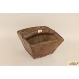 An Oriental wooden and metal bound trug